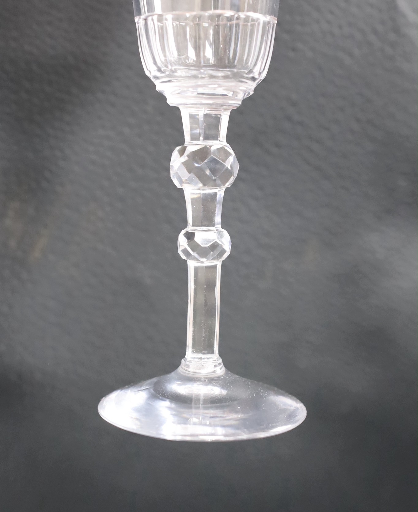 An 18th century facet stemmed ale glass, 22.5cms high